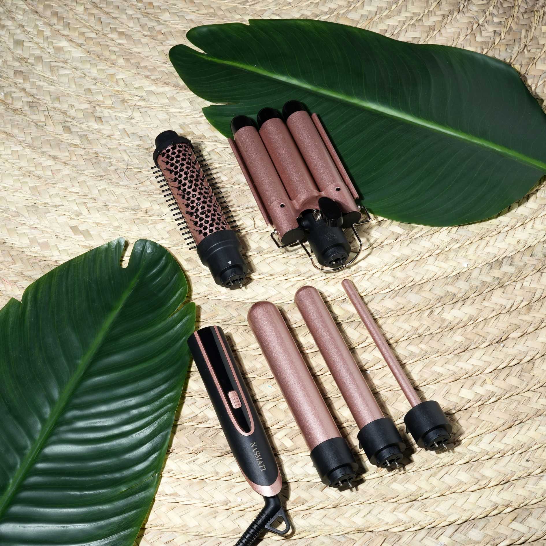 Revolutionize your look with the Nasmati™ 5-In-1 Magic Hair Curler. Create stunning curls, waves, and volume effortlessly with interchangeable barrels designed for all hair types. Your go-to tool for flawless, salon-quality results at home.